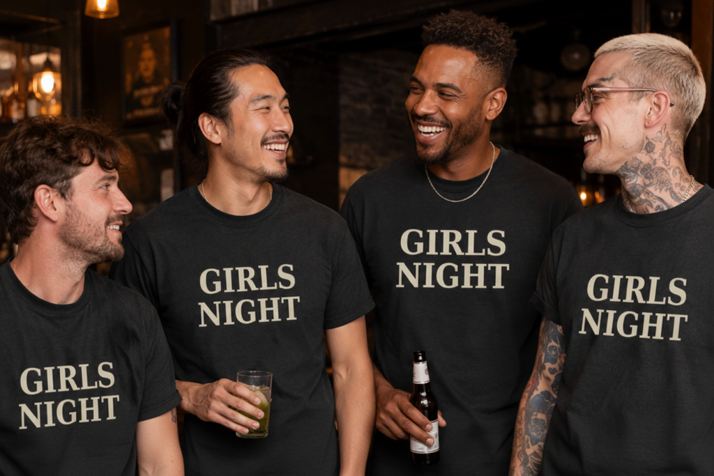 Group of men wearing black Girls Night t-shirts at a bar
